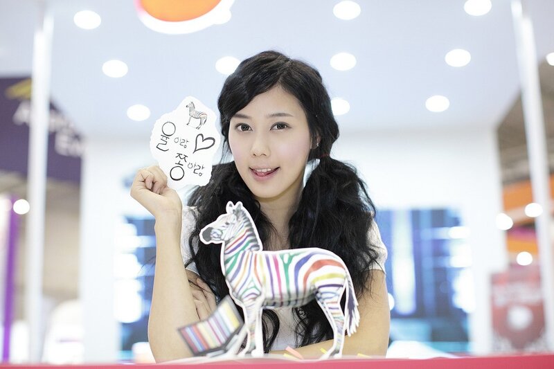 woman holding zebra cutout