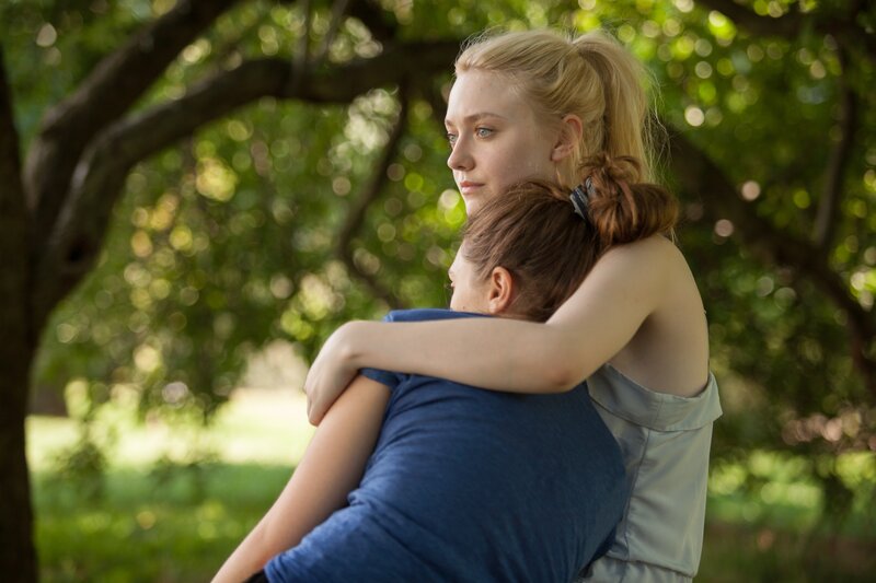woman hugging another woman