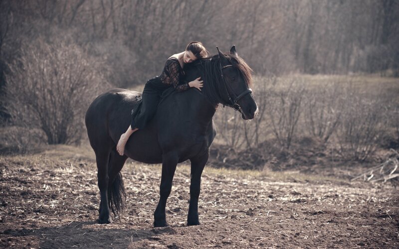 Woman Hugging Black Horse — Serene