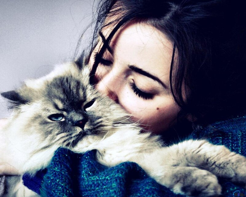 Woman Hugging Cat