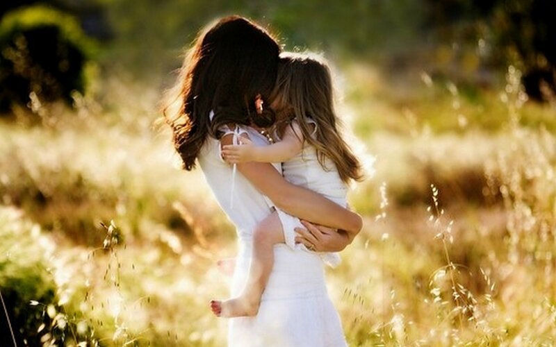 Woman Hugging Child — White