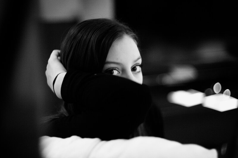 Woman Hugging Herself — Black