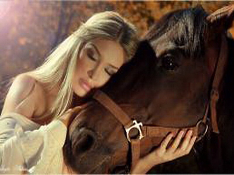 Woman Hugging Horse