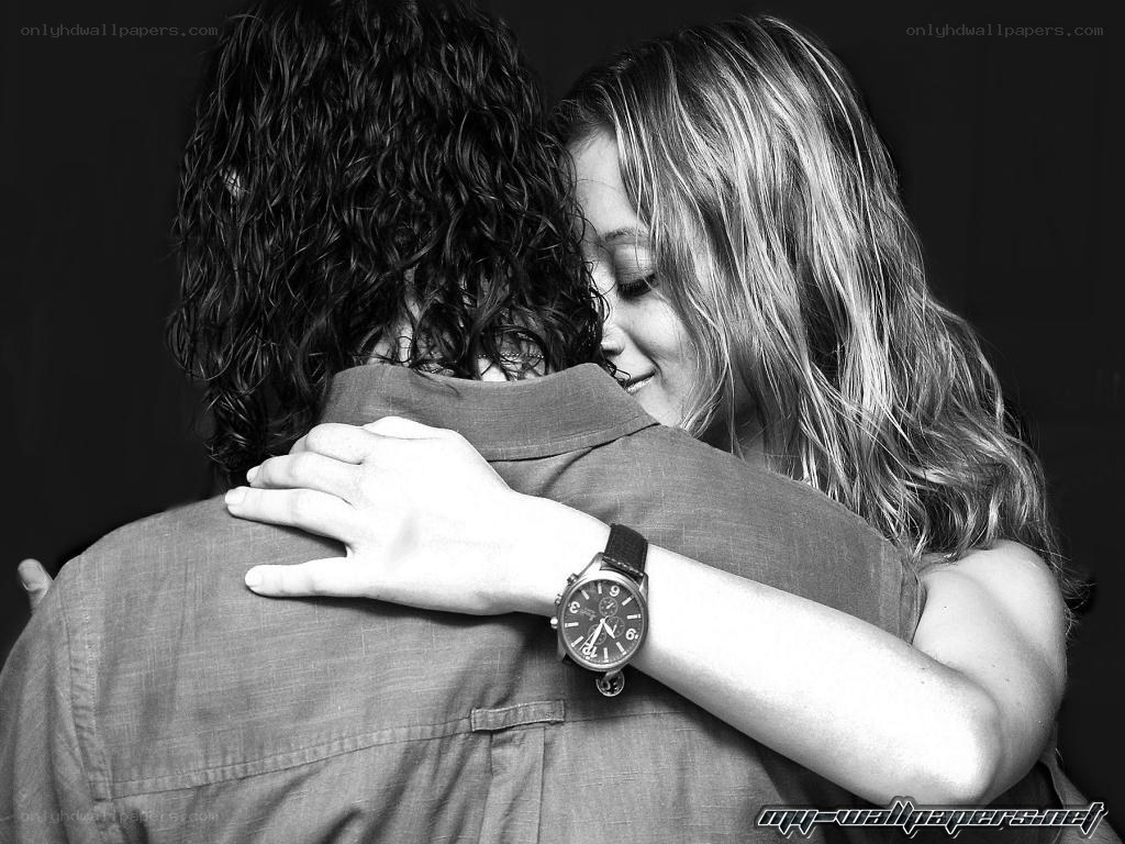 woman hugging man from behind