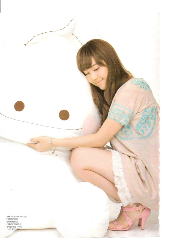 woman hugging plush toy