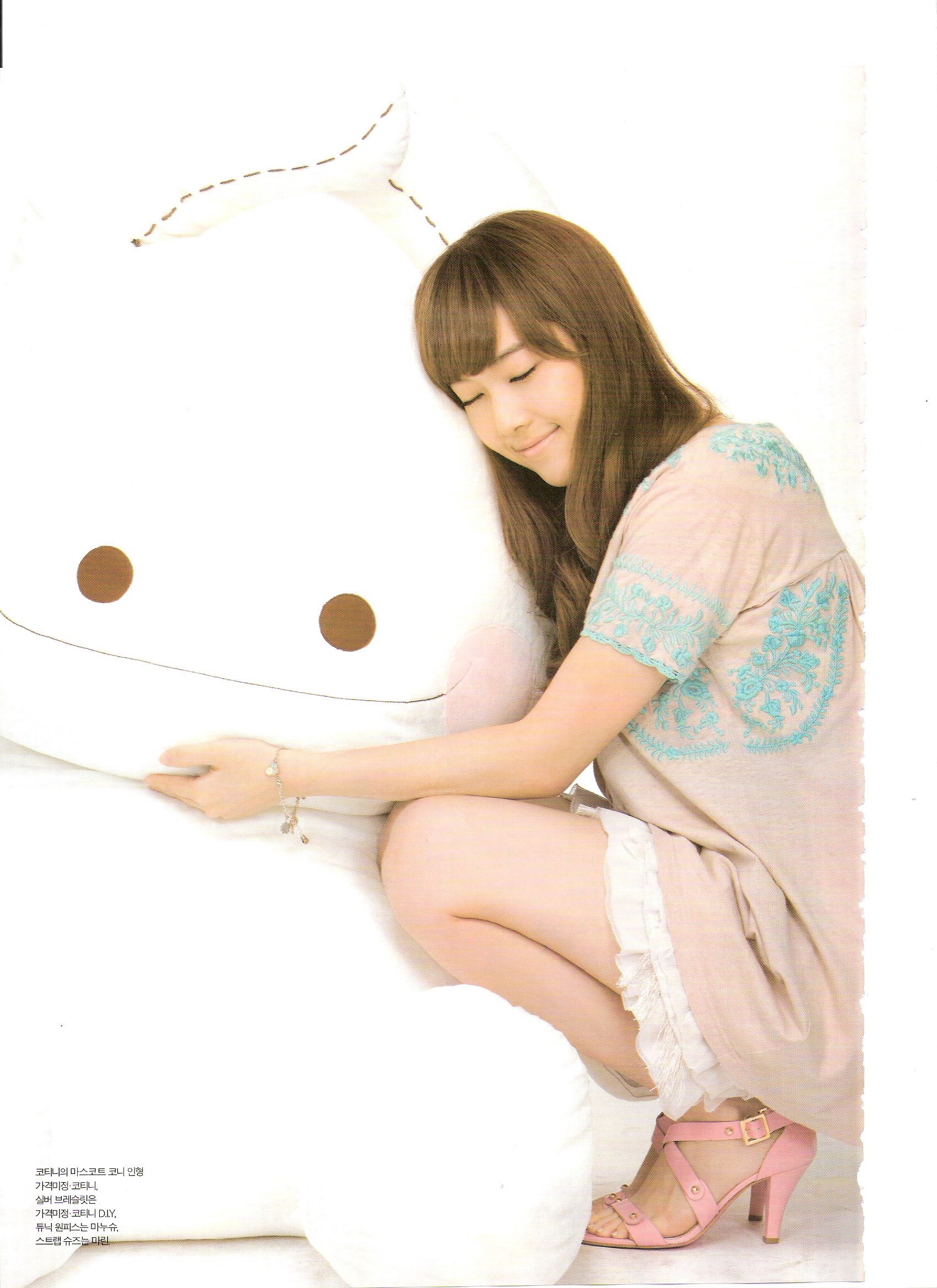 woman hugging plush toy