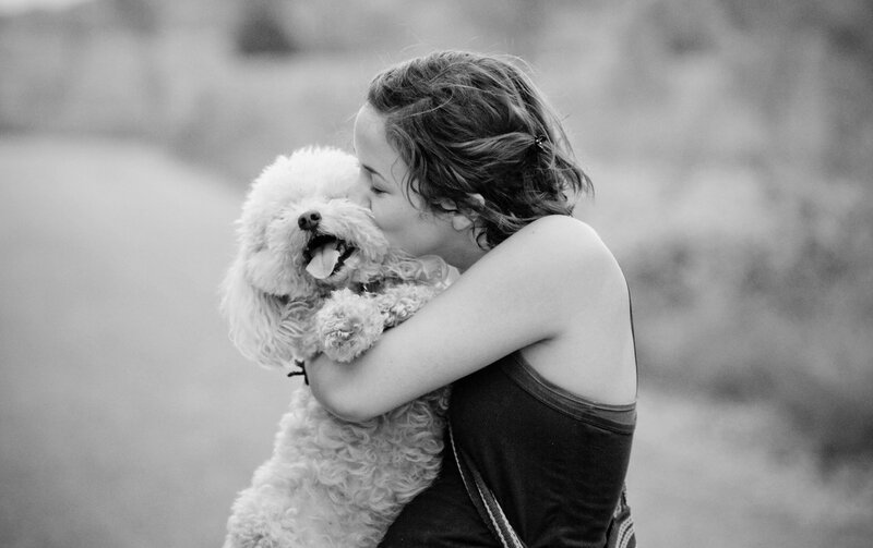 Woman Hugging Poodle