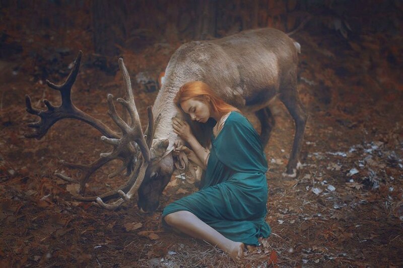 Woman Hugging Reindeer