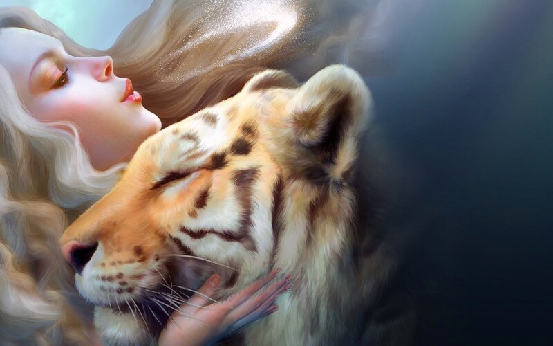 Woman Hugging Tiger Cub