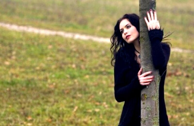 Woman Hugging Tree