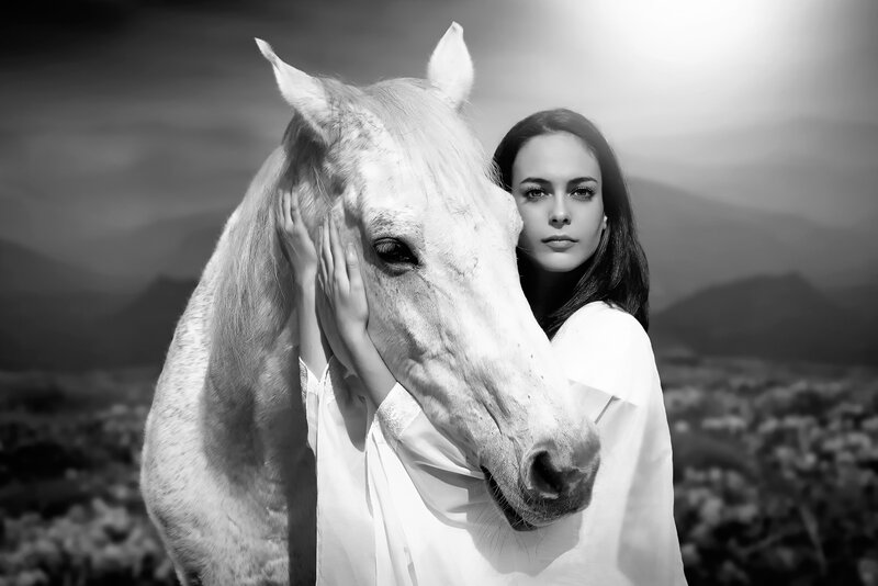 Woman Hugging White Horse — Black, Dramatic