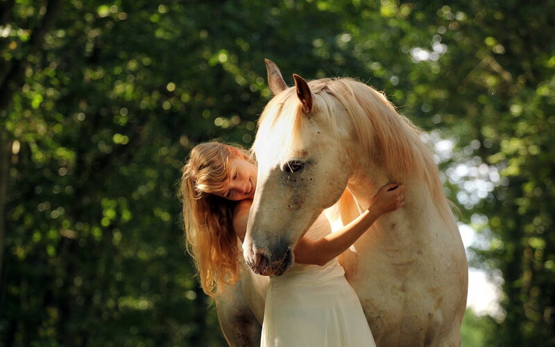 Woman Hugging White Horse — Serene