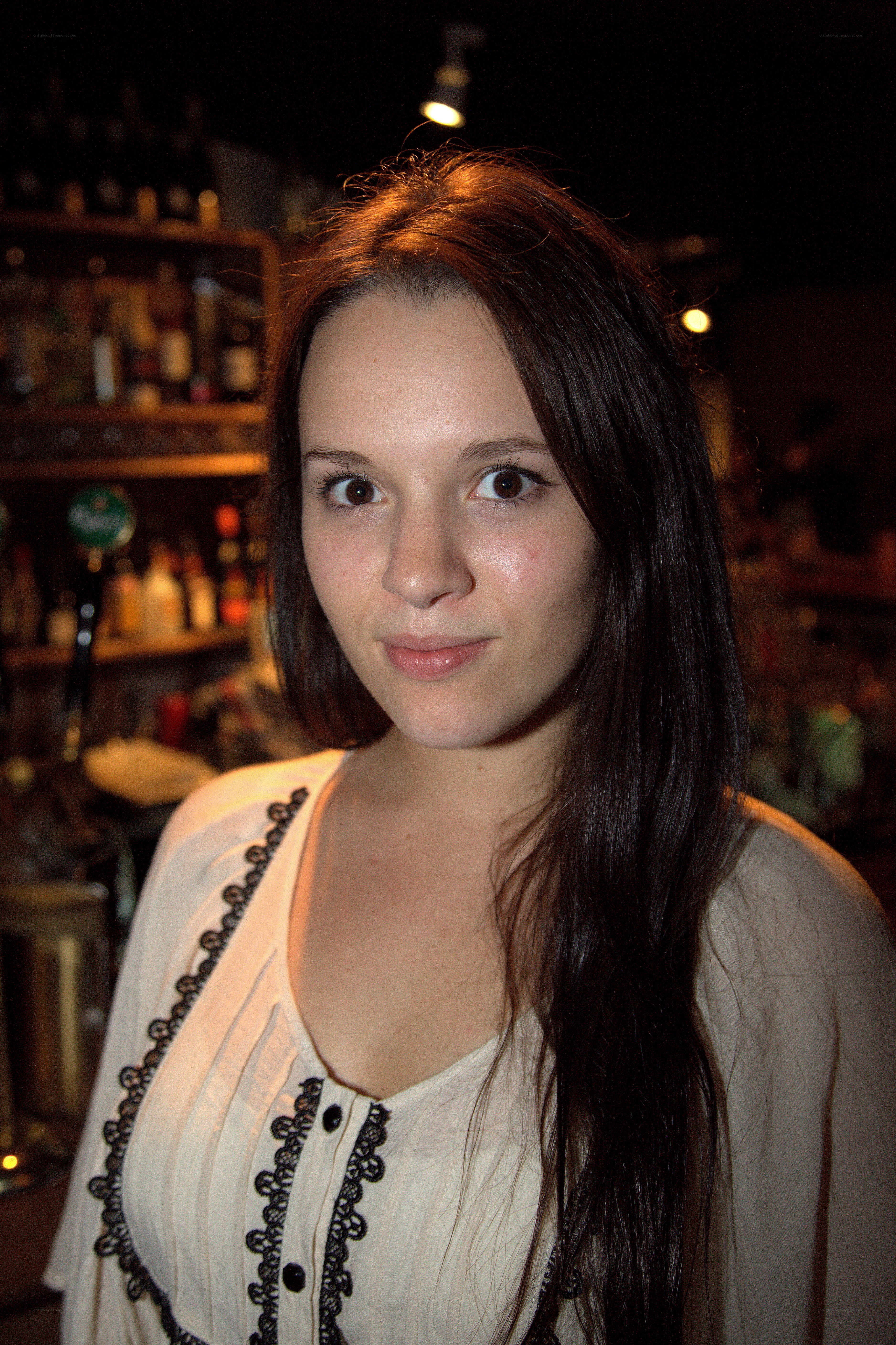 woman in a bar setting