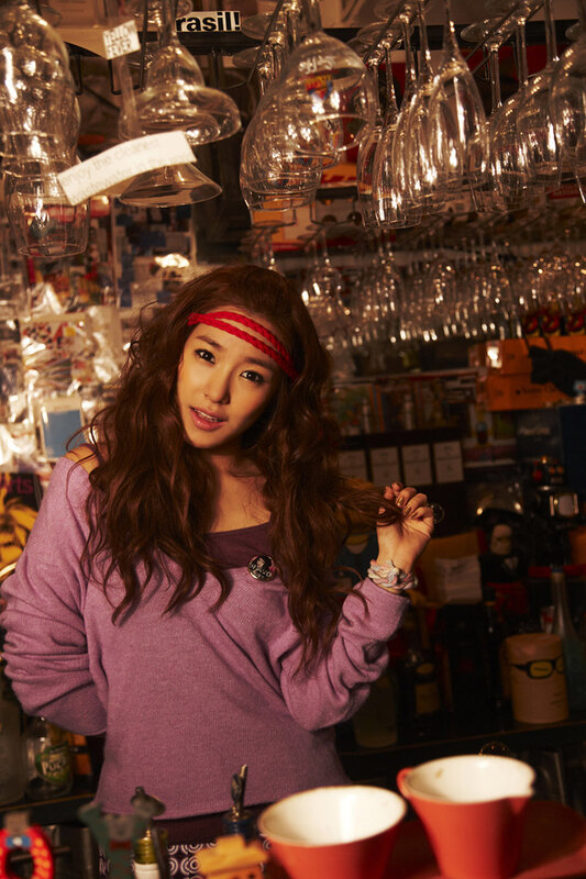 woman in a bar with wine glasses