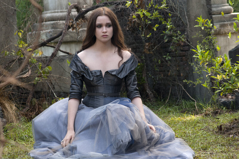 Woman in a Blue Dress — Dramatic, Afternoon