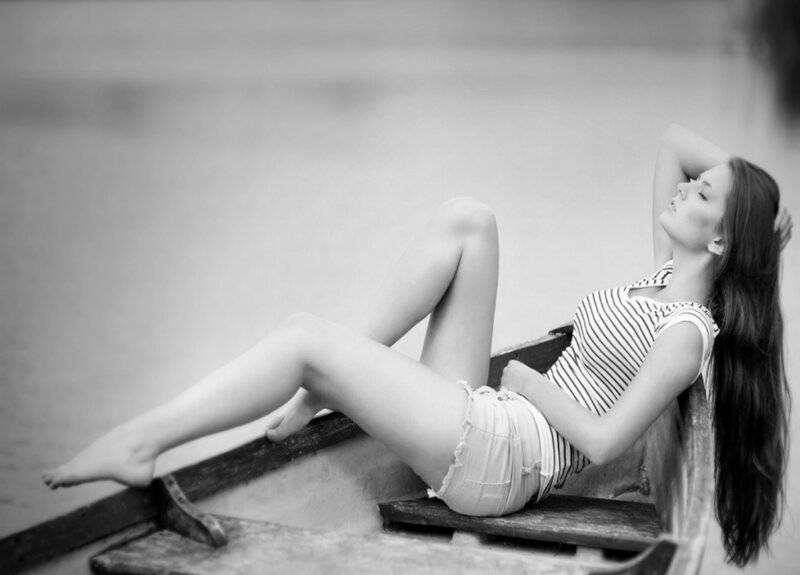 Woman in a Boat — Black, Serene, Photograph, Water