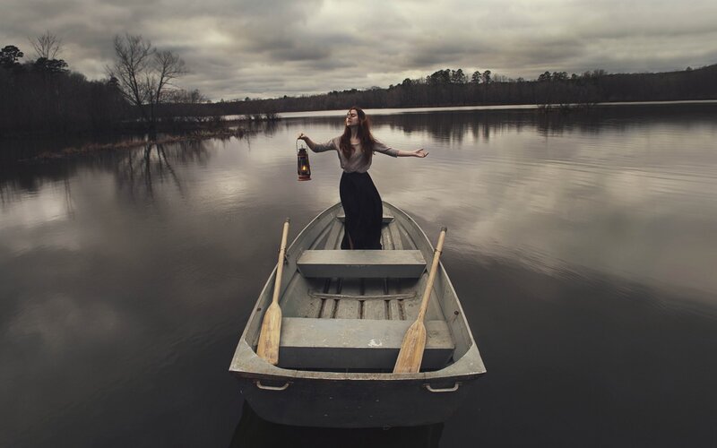 Woman in a Boat — Gray, Dramatic, Afternoon