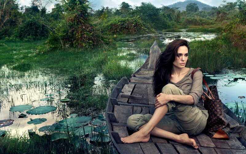 Woman in a boat on a swamp
