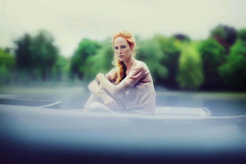 woman in a boat on water