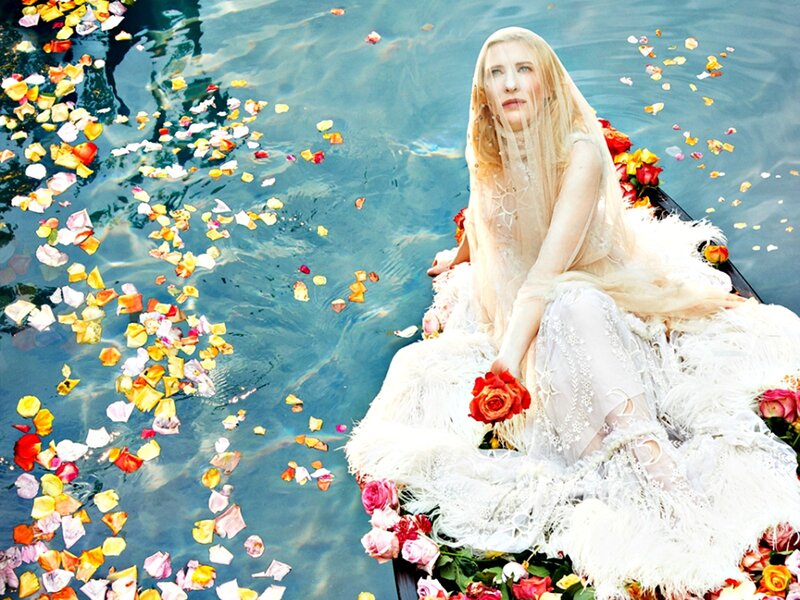 Woman in a Boat — White, Serene, Afternoon, Photograph