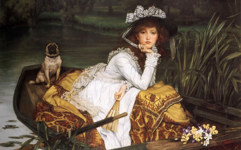 Woman in a boat with a pug