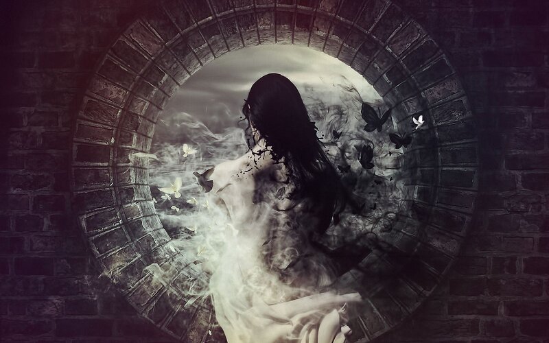 woman in a brick archway