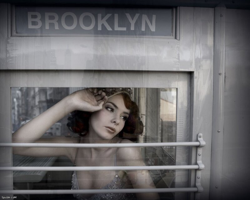 Woman in a Brooklyn phone booth