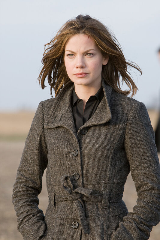 woman in a brown coat