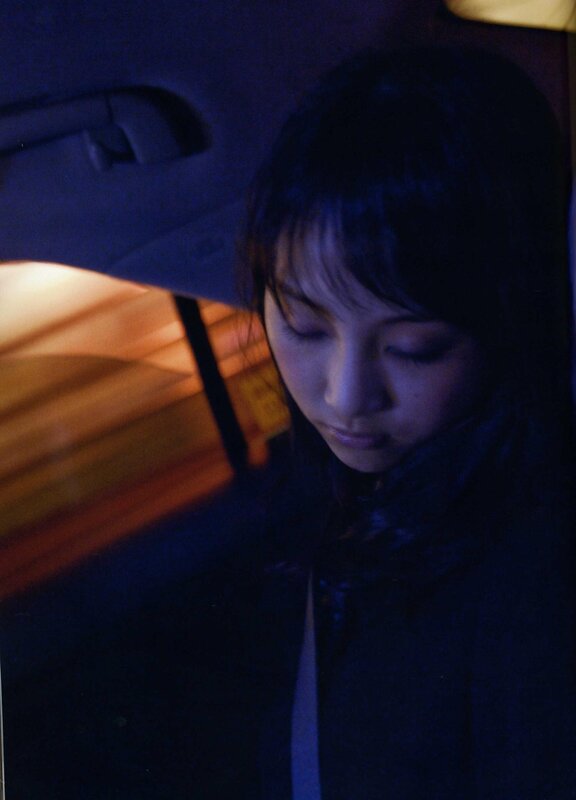 woman in a car at night