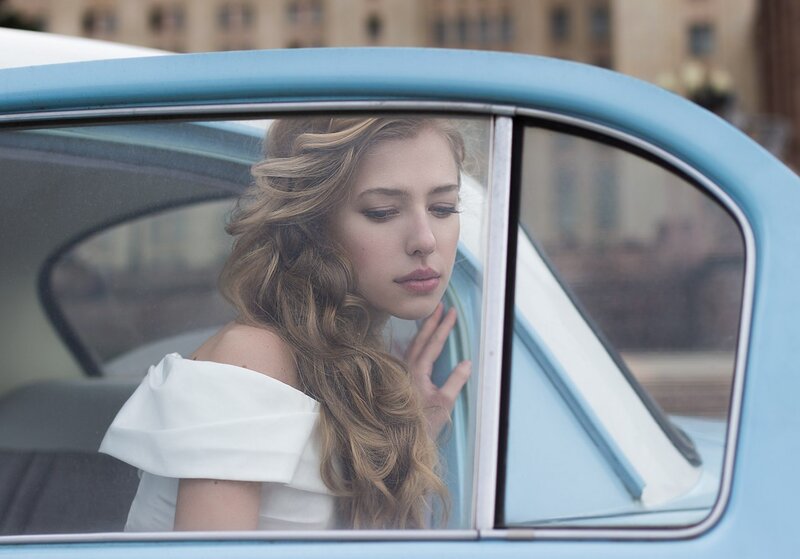 Woman in a Car — Blue, Contemplative