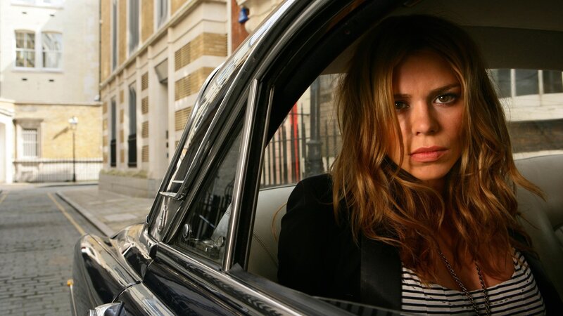 woman in a car on street