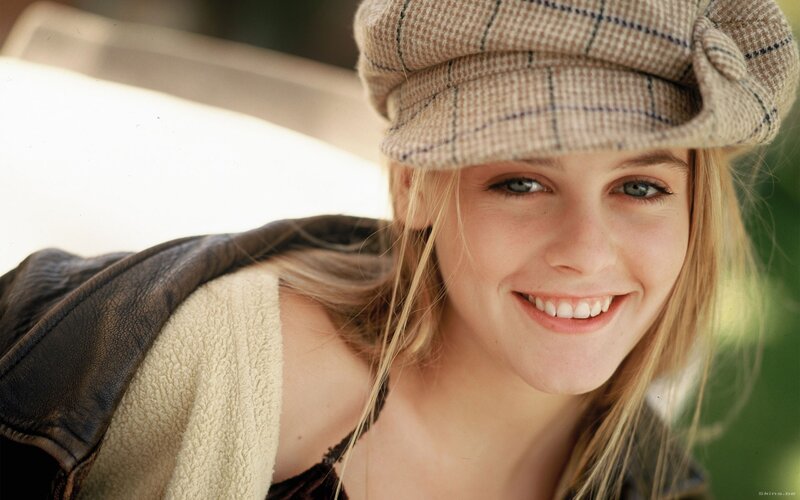 woman in a checkered hat