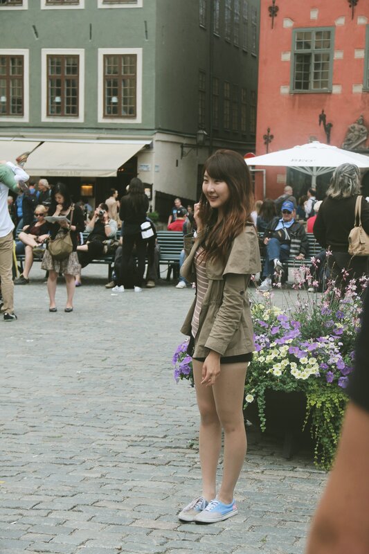 Woman in a city square