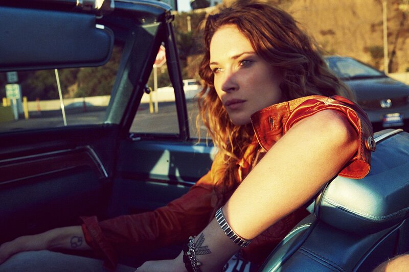 woman in a convertible car
