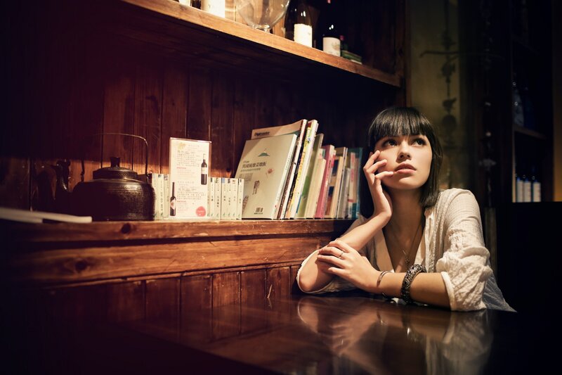 woman in a cozy bookstore