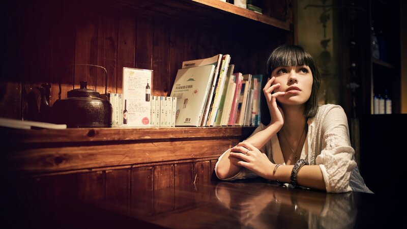 woman in a cozy bookstore