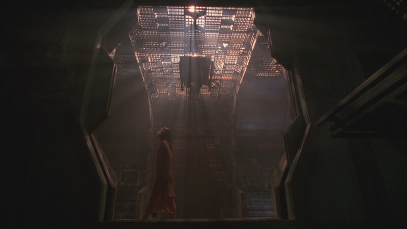 woman in a dark corridor
