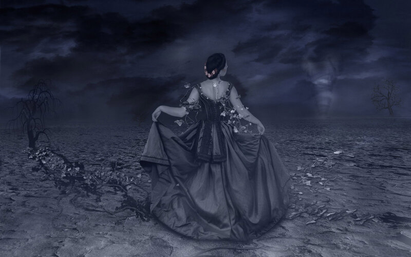 Woman in a dark landscape