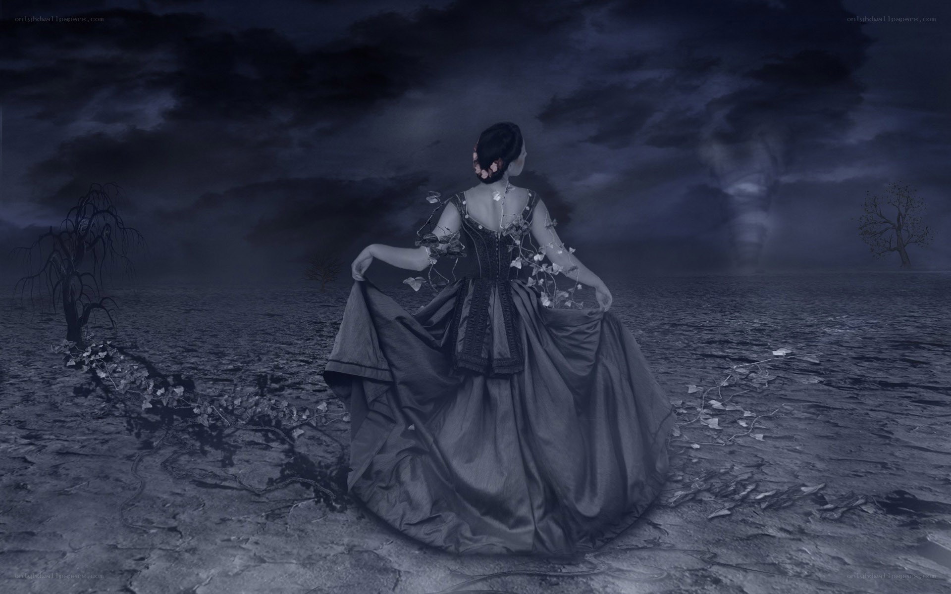 Woman in a dark landscape