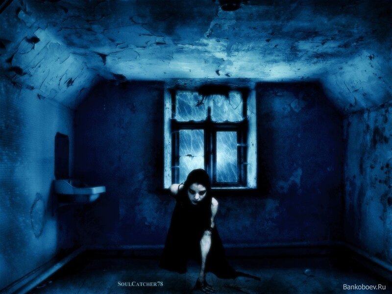 woman in a dark room