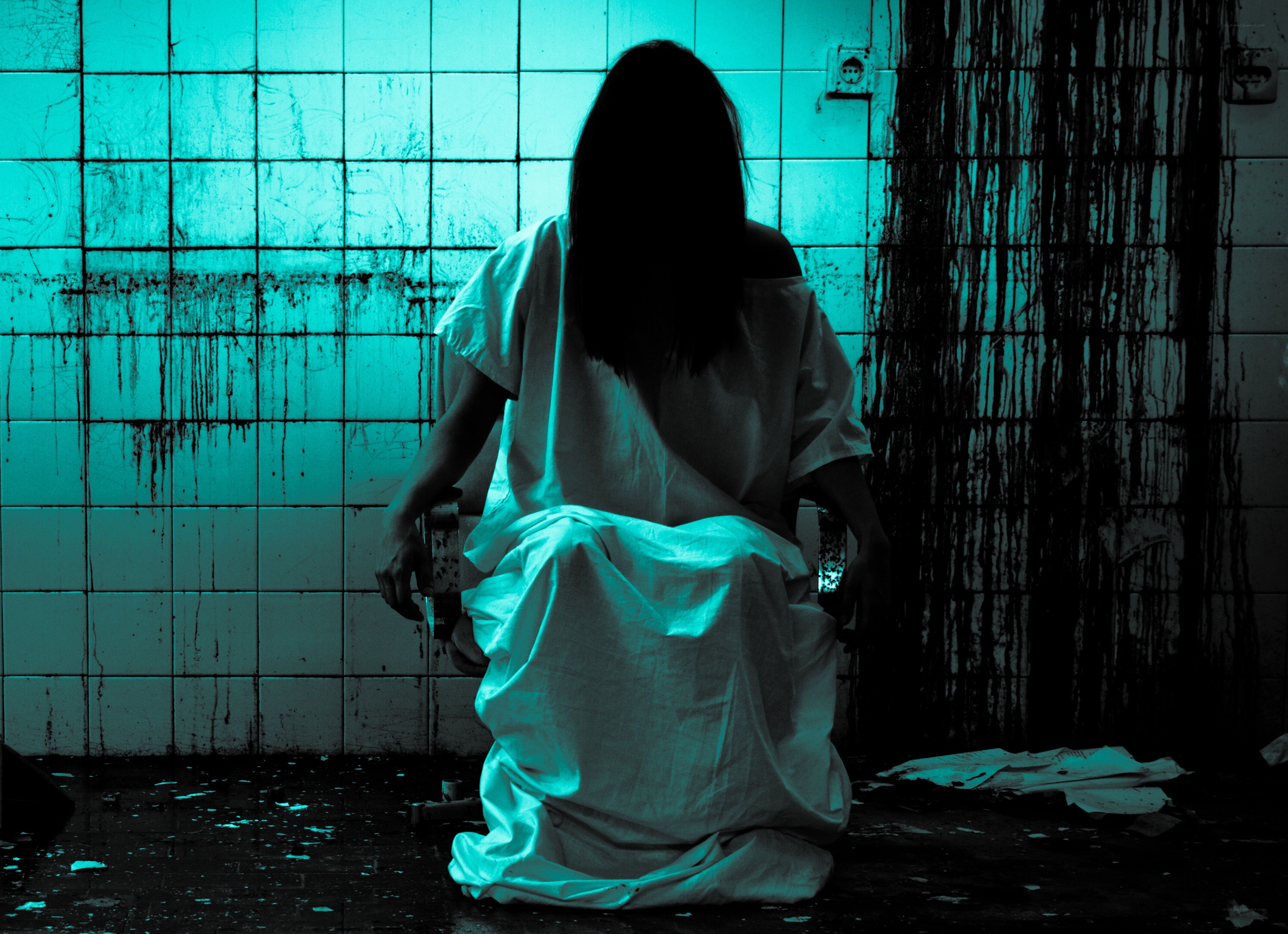 woman in a dark room