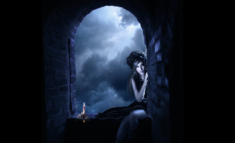 woman in a dark window