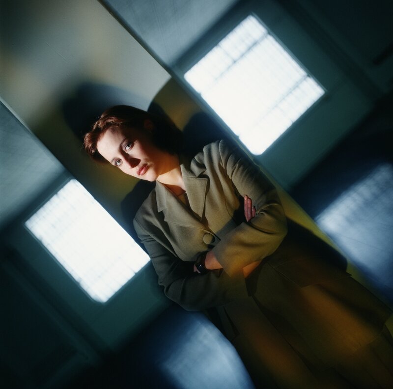 woman in a dimly lit room