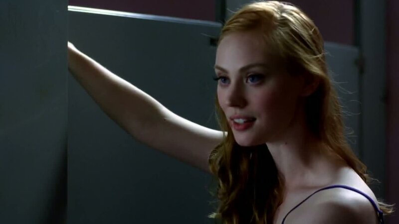 woman in a dimly lit room