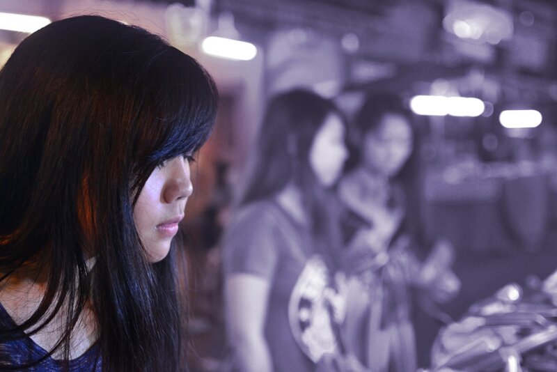 woman in a dimly lit room
