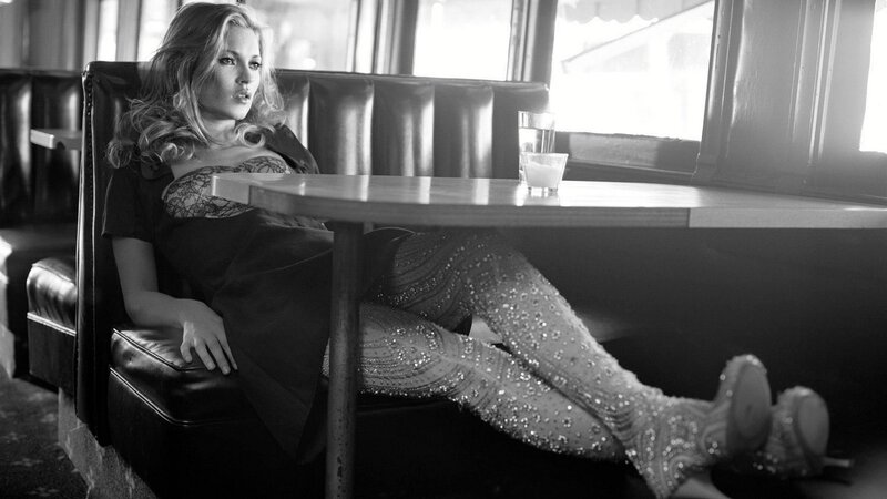 Woman in a diner booth