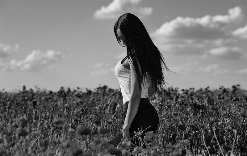 Woman in a Field — Black, Serene, Afternoon, Photograph, Sky