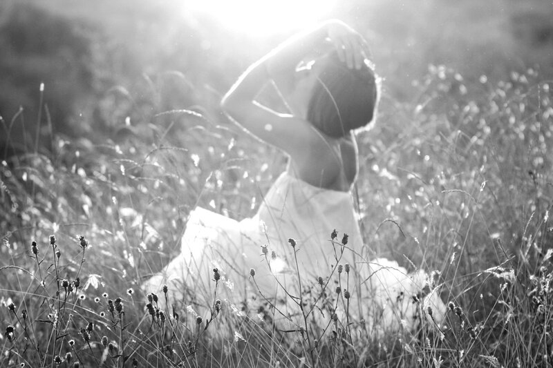 Woman in a Field — Black, Serene, Afternoon, Photograph