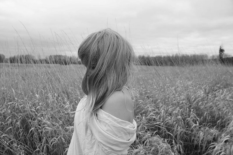Woman in a Field — Black, Serene