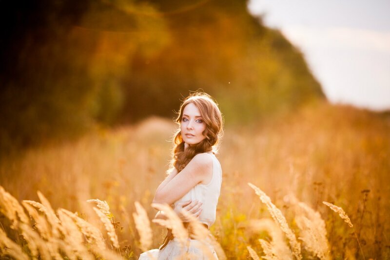 Woman in a Field — Gold, Serene, Sunset, Photograph, Grass